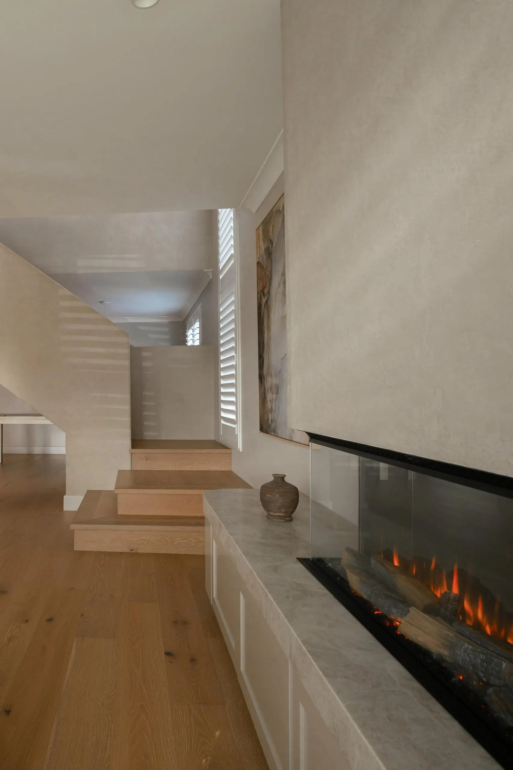 Hallway fireplace in the Driftmere project, the Central Coast, by Clove Interiors