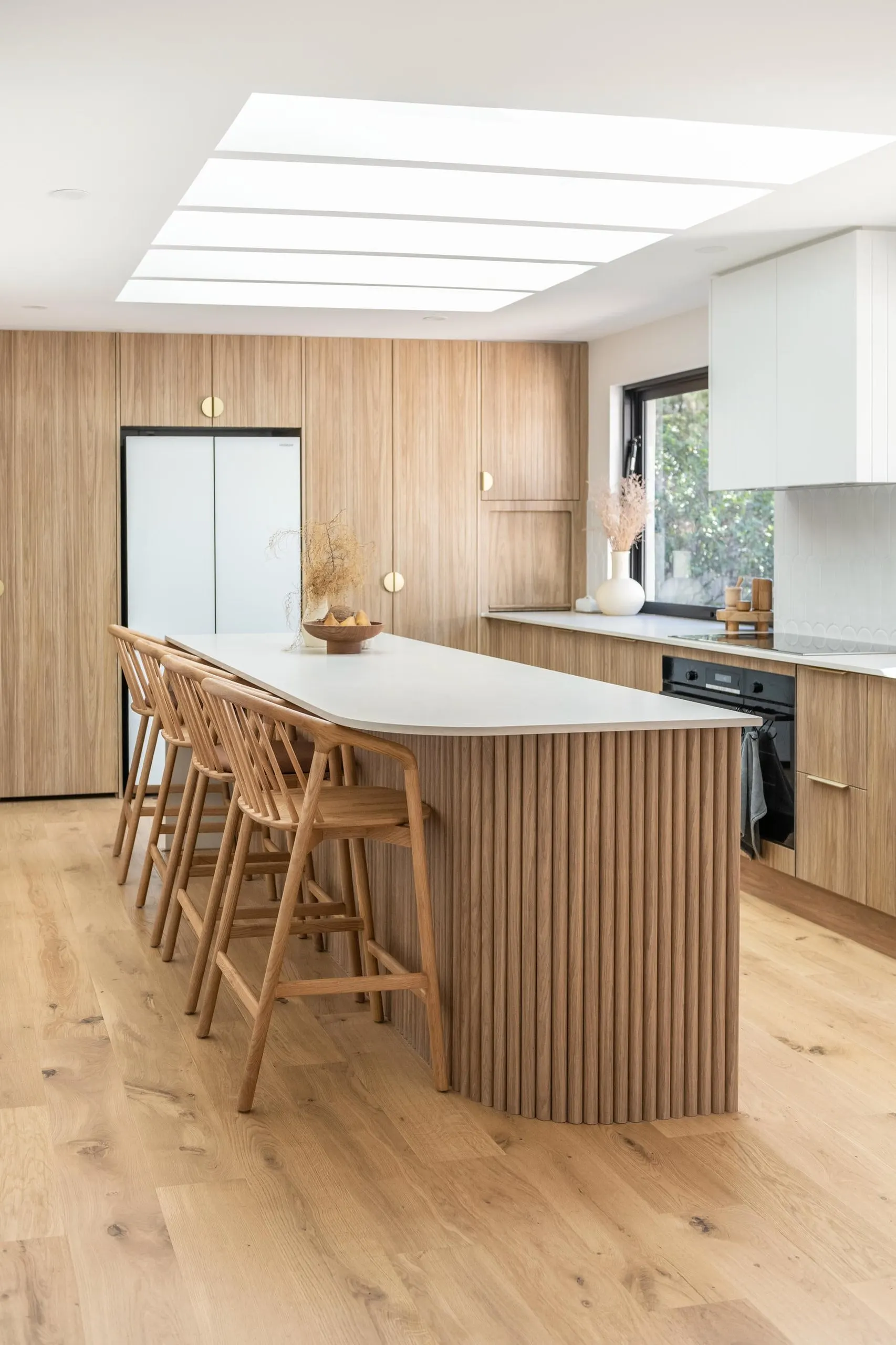 Kitchen island in the Barradise project, the Central Coast, by Clove Interiors