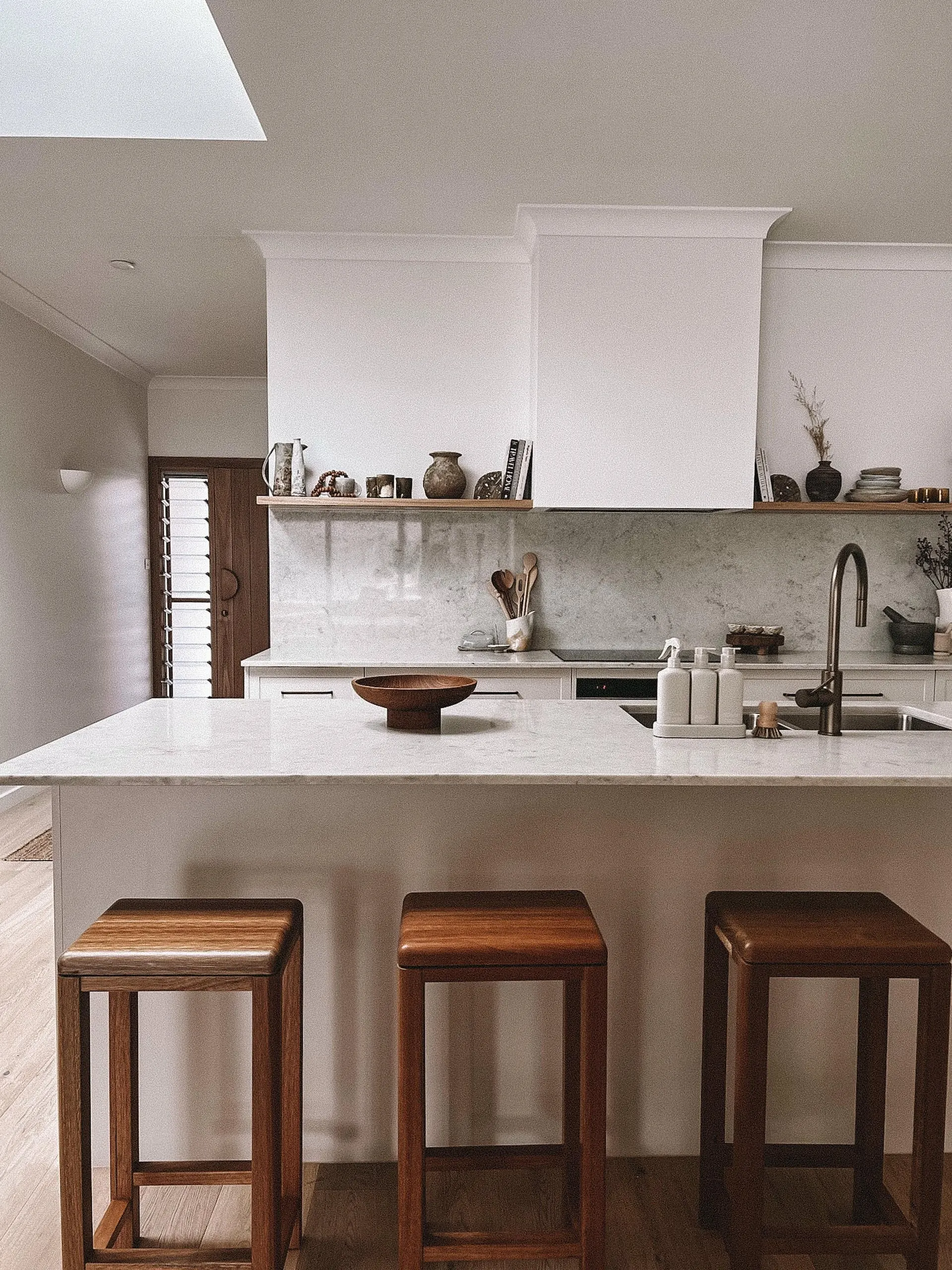 Kitchen island in the Havenridge project, the Central Coast, by Clove Interiors