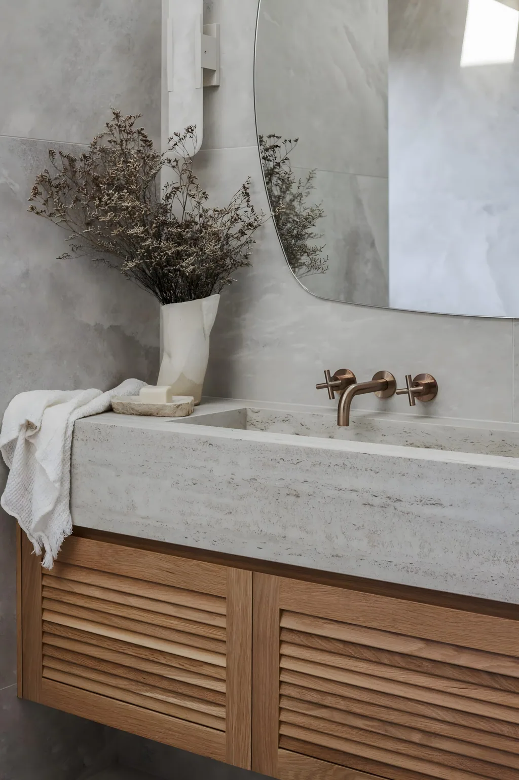 Dekton integrated stone sink in a bathroom by Clove Interiors